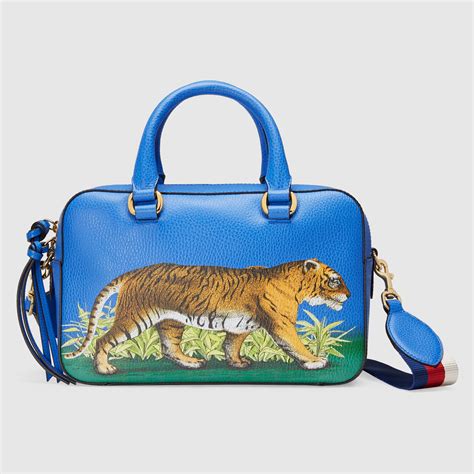 tiger print gucci bag|Gucci handbag with lion head.